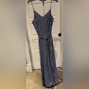 New with tags stripe jumpsuit (navy and White) wide legs. Size Medium